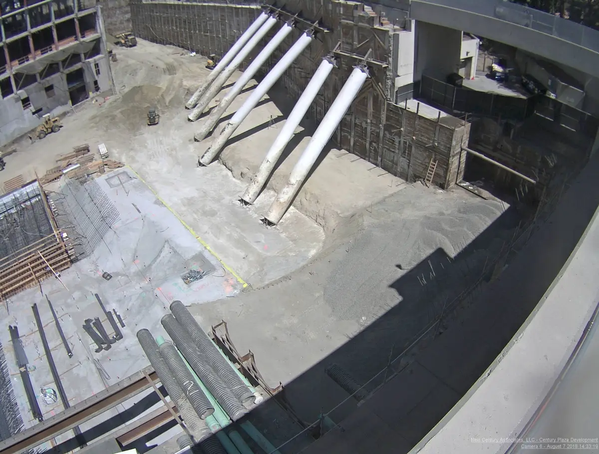 Raker bracing beside an existing structure at Century Plaza