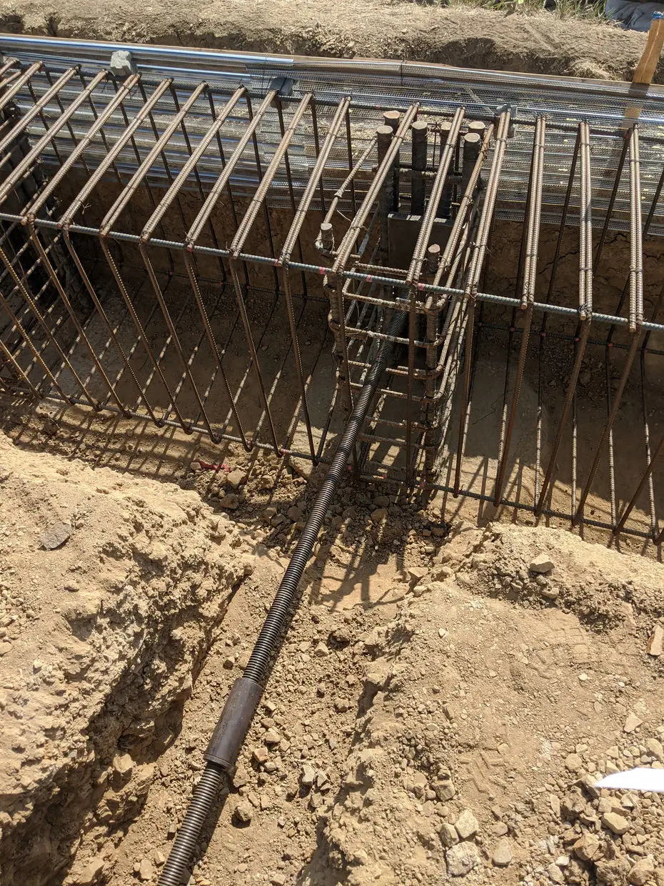 Reinforcing steel set in a hillside excavation
