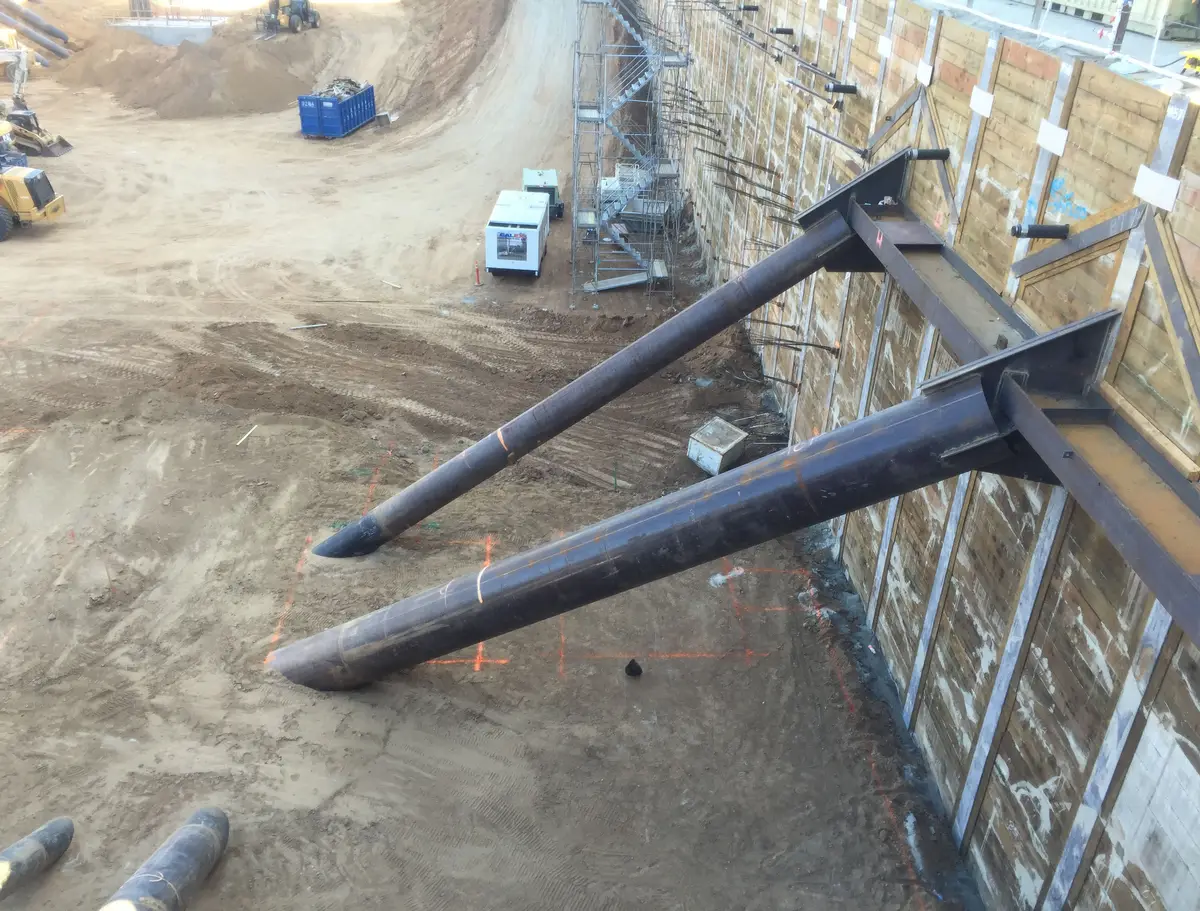 Steel rakers supporting a shoring wall at BLVD 6200
