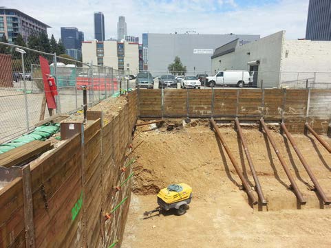 Excavation and shoring beside the alley at 12th and Grand